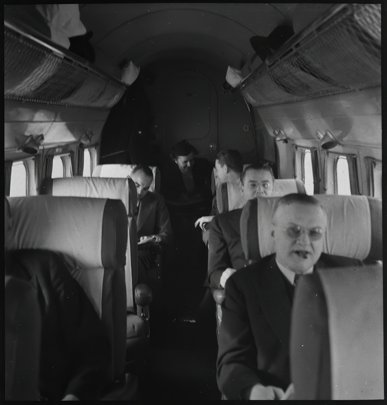 Passengers in Lockheed 14 H2 aircraft of trans Canada Air Lines en route to Moncton 16 October 1939.